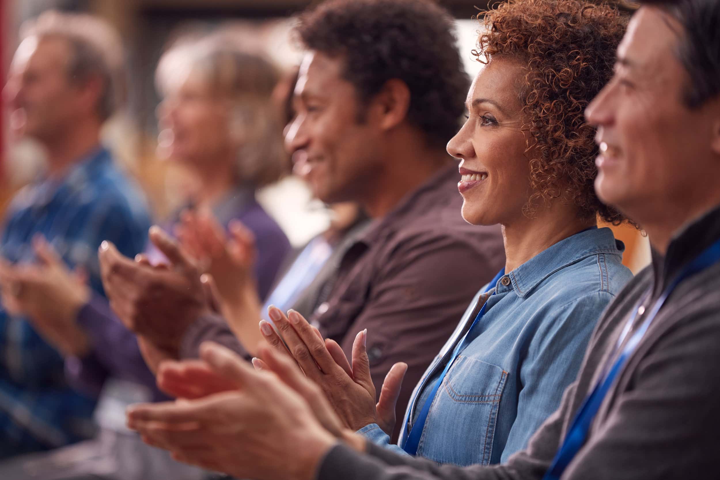 3 Steps to Maintain Organizational Ethos and Build Resilience - coworkers clapping